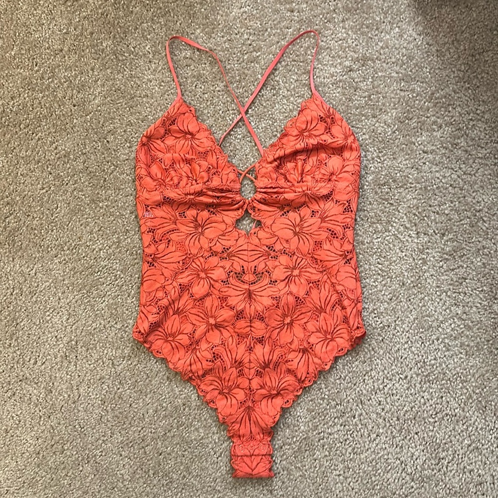 Orange floral see through body suit